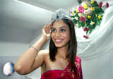 Femina Miss India World 2006 Amruta Patki fixes her crown at the launch of a professional institute in Bhopal