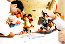 Waiting for their turn: About three crore tax assessees with nearly 65 lakh in Delhi alone filing the income-tax returns at special counters. 