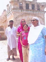 Ms Rajinder Kaur Bulara, former MP, her daughter and grand-daughter, standing on the third floor with Chann, a Muslim, who at present resides in the ancestral house of Ms Bulara