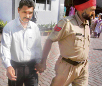 A man arrested for bogus voting at a polling booth in  Mohali on Sunday.