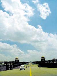 A view of monsoon clouds at Rajpath in the Capital on Sunday.