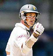 South Africas Jacques Rudolph celebrates on completing a half century on the fourth day of the first Test against Sri Lanka in Colombo on Sunday. 