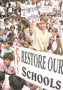 Underprivileged children demonstrate for their fundamental right to education near the Supreme Court in the Capital on Monday.