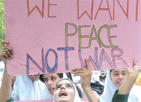 Little activists under the banner of Lok Raj Sangathan holding placards during a march to the Israeli embassy, protesting against the continued bombing of Lebanon by Israel in the Capital on Monday.