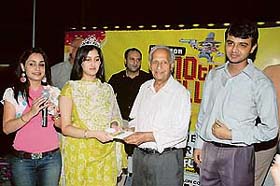 Mr Nek Chand awards the 10 millionth customer of Fun Republic in Chandigarh