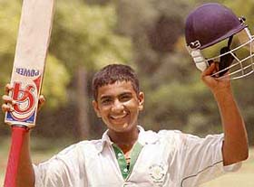 Aayush Raj Soni in joyous mood after scoring a sparkling century during the U-16 Indo-Pak friendship match at St Johns cricket ground, Sector 26