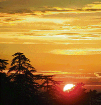 The sun plays a peak-a-boo amidst the lush hill foliage and the skys myraid hues at breezy mornings and dew-drenched evenings. The skies seem to compete the suns playful antics by stretching languidly.