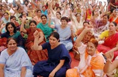 Members of the Punjab and Chandigarh College Teachers Union demonstrate at the District Administrative Complex in Jalandhar on Tuesday. 