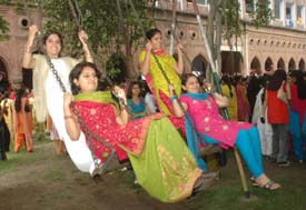 Students of Kanya Maha Vidyalaya celebrate Teej on Saturday. 