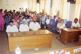 Faculty members and students attend a lecture on e-governance at Shaheed Udham Singh College of Engineering and Technology in Tangori