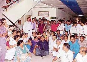 Employees of the Christian Medical College and Hospital hold a protest against pay scale anomalies in front of the office of Director in Ludhiana