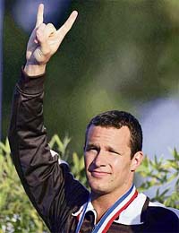 Brendan Hansen celebrates after setting a new world record in the mens 100 metre breaststroke during the finals for the 2006 Cocono Phillips National Championships and USA team trials in Irvine, California