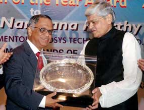 West Bengal Governor Gopal Krishan Gandhi presents Man of the Year Award 2004-05 to Narayana Murthy, Chairman and chief mentor of Infosys Technologies, in Kolkata on Thursday.