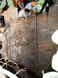 Villagers engaged in recovering the body of a man who fell to death in a well in Mullanpur on Thursday night.