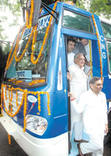 Haryana Chief Minister Bhupinder Singh Hooda, Transport Minister Randeep Singh Surjewala and Congress leader Janardhan Diwedi at the launch ceremony