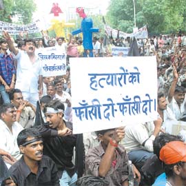 BJP activists demanding death penalty for perpetuators of the Inderlok mass murder.
