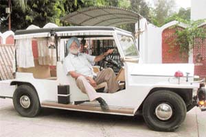 Ravi Mann poses in the car after his heart