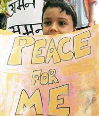 A child holds a placard during a demonstration near the Israeli Embassy, to protest Israels war against Lebanon, in New Delhi on Saturday