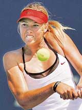 Russias Maria Sharapova hits a shot to Mary Pierce of France during the Acura Classic in Carlsbad, California, on Friday