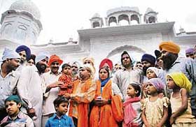 Prince, who was recently rescued from a 60-foot hole in Kurukshetra district, visits Nada Sahib Gurdwara in Panchkula on Sunday.