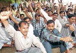Employees of Avery Freewheel Pvt Ltd protest against the management in Chandigarh on Sunday.