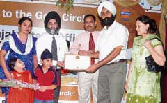 A dealer being honoured at an Indian Oil Corporation function at Parwanoo.