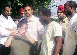 Three Nigerians and a woman, who were arrested in Delhi for their involvement in a fraud case, being produced at the District Courts, Mohali, on Monday.