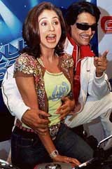 Urmila Matondkar flanked by Shamik Daver at a promotional function in New Delhi on Monday