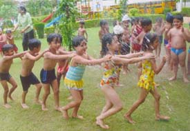 Little children make merry in the rain