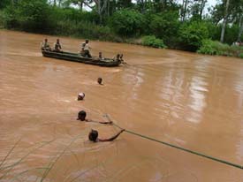 Search on for the bodies of children feared drowned