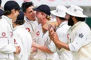 Englands Paul Collingwood is congratulated by team-mates after running out Pakistans Mohammad Yousuf during the fifth day of the third Test at Headingley in Leeds on Tuesday.