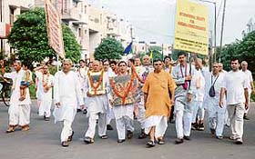 ISKCON devotees take part in a nagar sankirtan procession as a part of Krishna Janamasthami celebration at Sector 38 West in Chandigarh