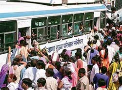 Women passengers throng the Rohtak bus stand on Wednesday to avail of the free travel facility on Raksha Bandhan.
