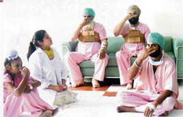Patients, who have undergone open heart surgery, take lessons in yoga at a hospital in Ludhiana on Tuesday. 