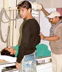 Jaswinder Kaur, who was shot at by her father, being treated at the DMCH, Ludhiana, on Wednesday.