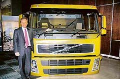 Mr Eric Lebeianc, Managing Director, Volvo India, poses with a new Volvo FH & FM truck in Kolkata