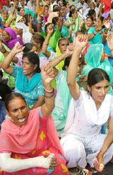 Women workers from factories and handloom units in Panipat demonstrate for the acceptance of their demands at Parliament Street in New Delhi