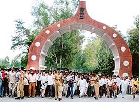 Visitors rush through Nishan-e-Hind to watch the retreat ceremony at the zero line on the Hussainiwala border. 