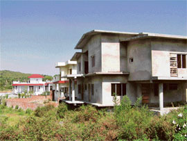An under-construction house in Dharamsala, with no signature of hill architecture in its design.