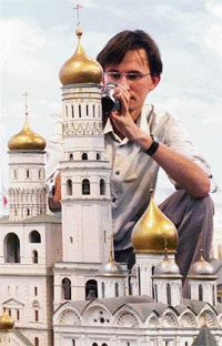 A man videos a small-scale model of Moscow. The 16-metre square model, constructed by more than 300 persons in 1977 has been put up for auction for an asking price of $3,80,000.