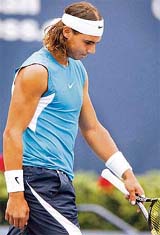 Rafael Nadal reacts after losing to Tomas Berdych in the third round of the Toronto Masters tennis tournament on Thursday. Berdych won 6-1, 3-6, 6-2.