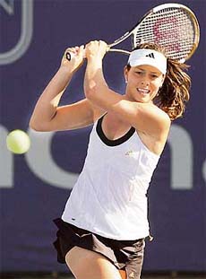 Ana Ivanovic of Serbia & Montenegro hits a return to Anna-Lena Groenfeld of Germany during the pre-quarterfinals of the JP Morgan Chase Open in California on Thursday. Ivanovic won 6-1, 6-4.