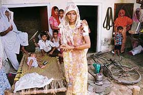 Members of one of the families whose house was ransacked by Punjab police personnel in the wee hours of Saturday at Lalru
