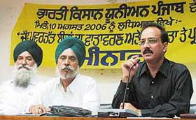 Eminent food expert Devinder Sharma addresses a seminar organised by the BKU in Ludhiana.