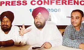 The president of the District Youth Club, Mohali, Mr Harpreet Singh, along with other members, addresses a press conference in Mohali on Sunday