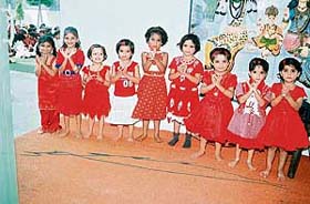 Students of Adarsh Academy perform a group song during the Independence Day celebrations on the school premises in Chandigarh