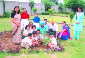 Students of DIPS, Karol Bagh, plant neem saplings in the campus