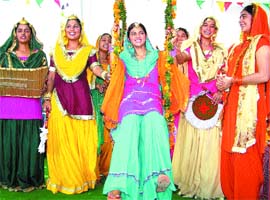Students of Hans Raj Mahila Maha Vidyalaya celebrate Teej in the college campus
