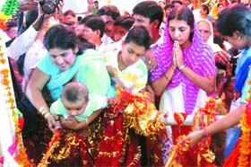 Devotees pay obeisance at the Gita Mandir in Model Town on the occasion of Janmashtami in Jalandhar