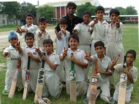 Players of the Mahajan Juniors XI who won the final in the 10th Chaman Lal Malhotra Cricket Tournament  played in Ludhiana